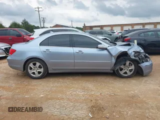 2006 Acura RL z VIN JH4KB16576C002362, wystawiony jako IAAI lot #42364606 z przebiegiem 189 746 mil mil oraz . Historia ofert i sprzedaży dostępna na DreamBid. Obrazek 13.