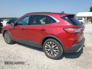 2020 Ford Escape Titanium with VIN 1FMCU9J95LUB28584, listed as a Copart auction lot 59967785 with 94,392 mi miles and Salvage title. Bid and sale history available at DreamBid. Image 2.