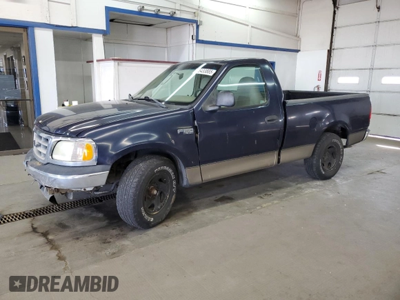 2003 Ford F-150 XL with VIN 1FTRF17293NA60031, listed as a Copart auction lot 55433885 with 186,557 mi miles and Salvage title. Bid and sale history available at DreamBid. Image 1.