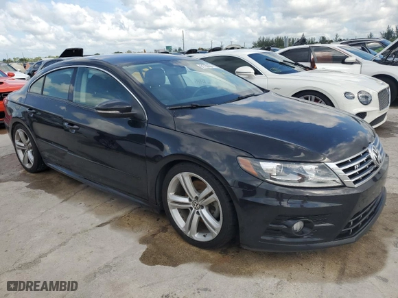 2014 Volkswagen CC R-Line with VIN WVWAN7AN5EE534548, listed as a Copart auction lot 61730364 with 104,545 mi miles and Salvage Title. Bid and sale history available at carsss.com. Image 4.