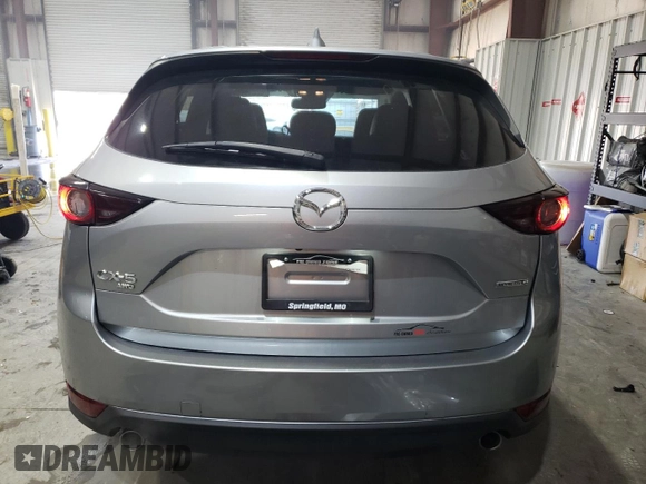 2021 Mazda CX-5 Touring with VIN JM3KFBCM7M0467530, listed as a Copart auction lot 42238385 with 33,277 mi miles and Salvage Title. Bid and sale history available at carsss.com. Image 6.