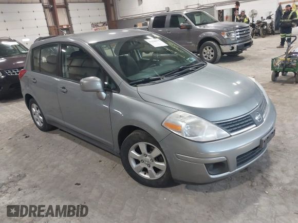 2009 Nissan Versa 1.8 SL with VIN 3N1BC13E99L409551, listed as a IAAI auction lot 41628375 with 214,873 mi miles. Bid and sale history available at carsss.com. Image 1.