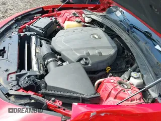 2019 Chevrolet Camaro 1LT z VIN 1G1FB3DS2K0142668, wystawiony jako IAAI lot #42957719 z przebiegiem 81 610 mil mil oraz . Historia ofert i sprzedaży dostępna na DreamBid. Obrazek 21.