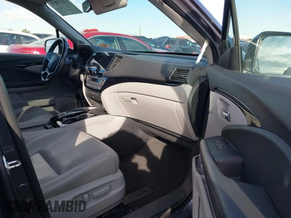 2019 Honda Pilot Touring 7-Passenger z VIN 5FNYF5H65KB020420, wystawiony jako IAAI lot #41575972 z przebiegiem 48 950 mil mil oraz . Historia ofert i sprzedaży dostępna na DreamBid. Obrazek 5.