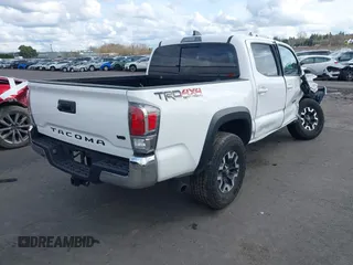 2023 Toyota Tacoma SR z VIN 3TMCZ5AN0PM541700, wystawiony jako IAAI lot #41819408 z przebiegiem 14 216 mil mil oraz . Historia ofert i sprzedaży dostępna na DreamBid. Obrazek 4.