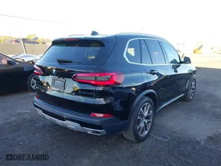 2023 BMW X5 sDrive40i with VIN 5UXCR4C06P9N83023, listed as a IAAI auction lot 41513687 with 42,211 mi miles. Bid and sale history available at carsss.com. Image 4.