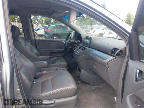 2006 Honda Odyssey EX-L z VIN 5FNRL38776B108949, wystawiony jako IAAI lot #42349613 z przebiegiem 206 240 mil mil oraz . Historia ofert i sprzedaży dostępna na DreamBid. Obrazek 5.