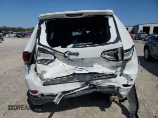 2022 Jeep Grand Cherokee Laredo X with VIN 1C4RJEAG1NC155952, listed as a Copart auction lot 52170235 with 74,695 mi miles and Salvage title. Bid and sale history available at DreamBid. Image 6.