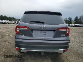 2020 Honda Pilot Touring 7-Passenger z VIN 5FNYF6H69LB005829, wystawiony jako Copart lot #52702555 z przebiegiem 90 746 mil mil oraz Szkoda całkowita • Salvage title. Historia ofert i sprzedaży dostępna na DreamBid. Obrazek 6.