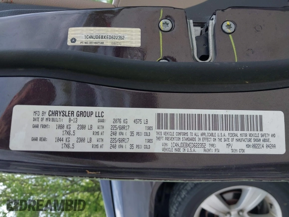 2014 Jeep Compass Latitude with VIN 1C4NJDEBXED622352, listed as a IAAI auction lot 42130403 with 149,024 mi miles. Bid and sale history available at carsss.com. Image 9.