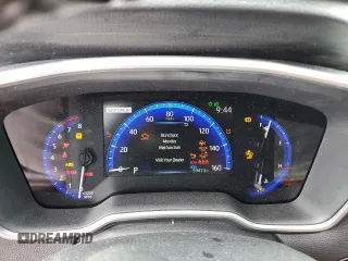 2022 Toyota Corolla Cross XLE with VIN 7MUDAABG2NV009663, listed as a Copart auction lot 55945735 with 59,473 mi miles and Salvage title. Bid and sale history available at DreamBid. Image 9.