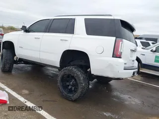 2019 GMC Yukon SLT with VIN 1GKS2BKC1KR167766, listed as a IAAI auction lot 41902532 with 97,793 mi miles. Bid and sale history available at carsss.com. Image 3.