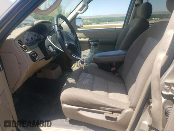 2004 Ford Explorer Sport Trac XLS z VIN 1FMZU67K34UC40112, wystawiony jako Copart lot #57877855 z przebiegiem 139 350 mil mil oraz Szkoda całkowita • Salvage title. Historia ofert i sprzedaży dostępna na DreamBid. Obrazek 7.