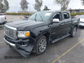 2018 GMC Canyon 4WD Denali with VIN 1GTG6EEN7J1318059, listed as a IAAI auction lot 41772860 with 80,230 mi miles. Bid and sale history available at carsss.com. Image 2.