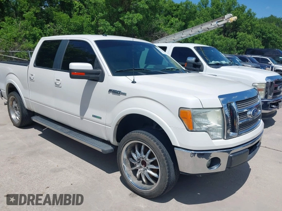 2011 Ford F-150 XLT with VIN 1FTFW1CT7BFA59275, listed as a IAAI auction lot 42111709 with 203,718 mi miles. Bid and sale history available at carsss.com. Image 1.