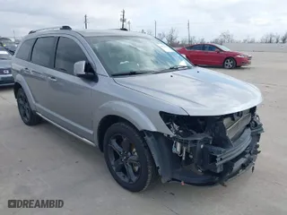 2018 Dodge Journey Crossroad with VIN 3C4PDDGG6JT387090, listed as a IAAI auction lot 41527077 with 71,637 mi miles. Bid and sale history available at carsss.com. Image 1.