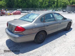 2005 Ford Taurus SE с VIN 1FAHP53205A262987, выставлен на аукционе IAAI как лот 42580079 с пробегом 104 996 миль миль и . История ставок и продаж доступна на DreamBid. Изображение 4.