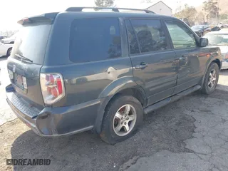 2006 Honda Pilot EX-L with RES with VIN 5FNYF28636B021196, listed as a IAAI auction lot 41461805 with 328,491 mi miles. Bid and sale history available at carsss.com. Image 4.