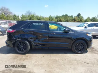 2023 Ford Edge SE с VIN 2FMPK4G92PBA17293, выставлен на аукционе IAAI как лот 42102653 с пробегом 32 617 миль миль и . История ставок и продаж доступна на DreamBid. Изображение 13.