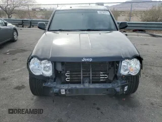 2008 Jeep Grand Cherokee SRT-8 with VIN 1J8HR78398C214004, listed as a Copart auction lot 48760375 with 165,318 mi miles and Salvage Title. Bid and sale history available at carsss.com. Image 5.