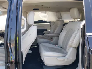 2021 Chrysler Pacifica Hybrid Touring L with VIN 2C4RC1L71MR599631, listed as a IAAI auction lot 42151965 with 67,401 mi miles and . Bid and sale history available at DreamBid. Image 8.