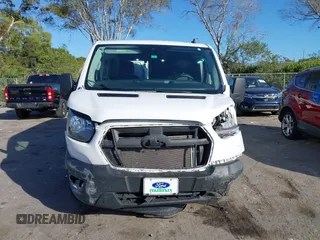 2023 Ford Transit Cargo with VIN 1FTBR1Y81PKB93787, listed as a IAAI auction lot 41253973 with 16,058 mi miles and . Bid and sale history available at DreamBid. Image 13.