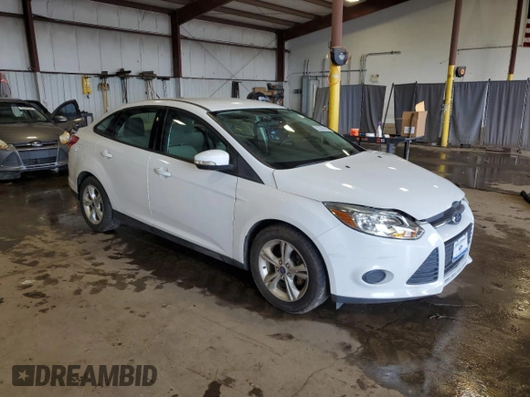2013 Ford Focus SE with VIN 1FADP3F22DL249403, listed as a Copart auction lot 62295645 with 83,328 mi miles and Salvage title. Bid and sale history available at DreamBid. Image 4.