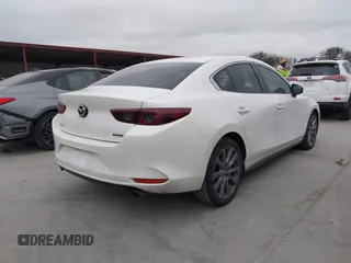 2021 Mazda 3 Preferred with VIN JM1BPACL3M1319795, listed as a IAAI auction lot 41780953 with 54,405 mi miles and . Bid and sale history available at DreamBid. Image 4.