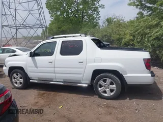 2012 Honda Ridgeline RTL with VIN 5FPYK1F57CB453096, listed as a IAAI auction lot 42206169 with 82,846 mi miles and . Bid and sale history available at DreamBid. Image 14.