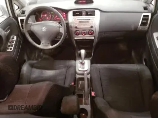 2005 Suzuki Aerio SX z VIN JS2RC61H555300879, wystawiony jako Copart lot #80481084 z przebiegiem 129 196 mil mil oraz Szkody całkowita. Historia ofert i sprzedaży dostępna na DreamBid. Obrazek 8.