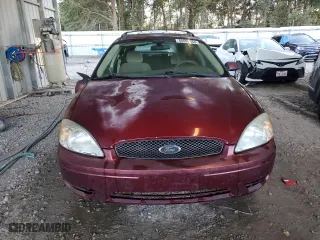 2004 Ford Taurus SE with VIN 1FAHP58U14A138414, listed as a Copart auction lot 86698364 with 124028 miles and Salvage Title. Bid and sale history available at carsss.com. Image 5.