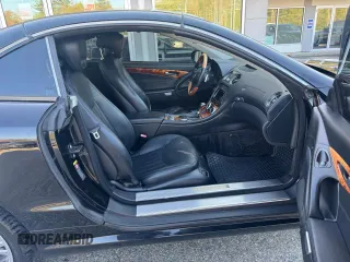 2009 Mercedes-Benz SL 550 z VIN WDBSK71F69F148290, wystawiony jako Copart lot #56976645 z przebiegiem 161 833 mil mil oraz Tytuł czysty. Historia ofert i sprzedaży dostępna na DreamBid. Obrazek 5.