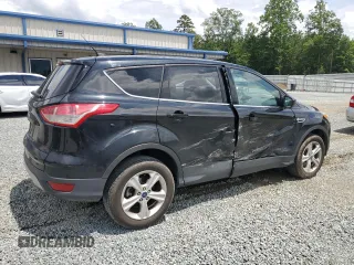 2014 Ford Escape SE with VIN 1FMCU9GX4EUE31879, listed as a Copart auction lot 61907565 with 42,107 mi miles and Salvage title. Bid and sale history available at DreamBid. Image 5.