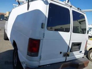 2009 Ford Econoline Cargo with VIN 1FTNE24L59DA13632, listed as a IAAI auction lot 42557559 with 90,487 mi miles and . Bid and sale history available at DreamBid. Image 3.