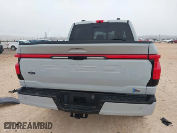 2023 Ford F-150 Lightning Pro z VIN 1FTVW1EL7PWG19070, wystawiony jako IAAI lot #41536193 z przebiegiem 22 654 mil mil oraz . Historia ofert i sprzedaży dostępna na DreamBid. Obrazek 17.