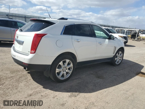 2014 Cadillac SRX Premium Collection z VIN 3GYFNGE32ES573872, wystawiony jako Copart lot #49871955 z przebiegiem 119 362 mil mil oraz Szkody całkowita. Historia ofert i sprzedaży dostępna na DreamBid. Obrazek 3.