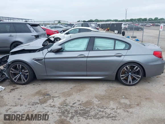 2014 BMW M6 with VIN WBS6C9C54EDV73926, listed as a IAAI auction lot 42421586 with 82,216 mi miles and . Bid and sale history available at DreamBid. Image 15.