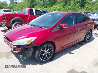 2015 Ford Focus SE with VIN 1FADP3F22FL275602, listed as a IAAI auction lot 42221421 with 112,864 mi miles and . Bid and sale history available at DreamBid. Image 2.