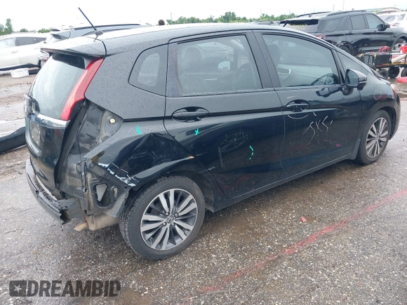 2015 Honda Fit EX-L with VIN 3HGGK5H89FM779891, listed as a IAAI auction lot 42492123 with 167,150 mi miles and . Bid and sale history available at DreamBid. Image 4.