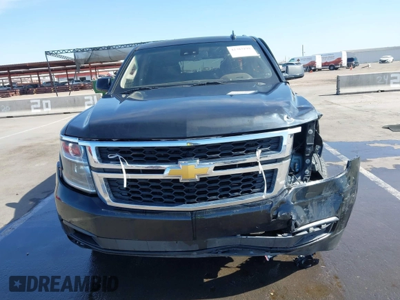 2018 Chevrolet Suburban LT z VIN 1GNSCHKC4JR111130, wystawiony jako IAAI lot #42383199 z przebiegiem 44 584 mil mil oraz . Historia ofert i sprzedaży dostępna na DreamBid. Obrazek 13.