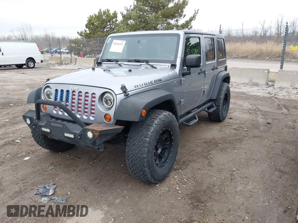 2013 Jeep Wrangler Unlimited Rubicon z VIN 1C4BJWFG7DL667083, wystawiony jako IAAI lot #42016912 z przebiegiem 148 933 mil mil oraz . Historia ofert i sprzedaży dostępna na DreamBid. Obrazek 17.