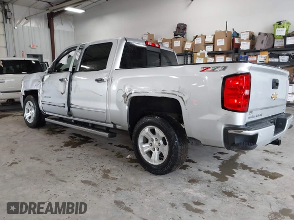 2017 Chevrolet Silverado 1500 LT with VIN 3GCUKREC2HG473554, listed as a IAAI auction lot 42220143 with 80,000 mi miles and . Bid and sale history available at DreamBid. Image 3.