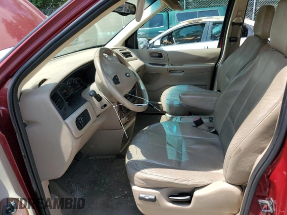 2003 Ford Windstar SEL with VIN 2FMZA534X3BA87386, listed as a Copart auction lot 63076564 with 199,075 mi miles and Salvage title. Bid and sale history available at DreamBid. Image 7.