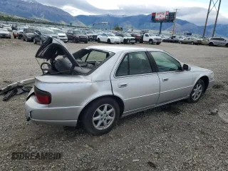 2003 Cadillac Seville Luxury SLS z VIN 1G6KS54Y53U262581, wystawiony jako Copart lot #55597595 z przebiegiem 80 832 mil mil oraz Szkoda całkowita • Salvage title. Historia ofert i sprzedaży dostępna na DreamBid. Obrazek 3.