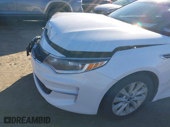 2016 Kia Optima LX with VIN 5XXGT4L36GG005859, listed as a IAAI auction lot 41053277 with 127,783 mi miles. Bid and sale history available at carsss.com. Image 19.