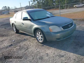 2005 Ford Five Hundred SE with VIN 1FAFP23105G164813, listed as a IAAI auction lot 41599553 with 134,847 mi miles. Bid and sale history available at carsss.com. Image 1.