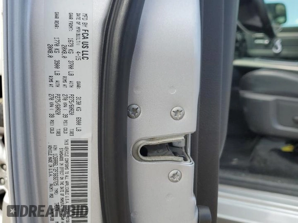 2015 Ram 1500 Outdoorsman z VIN 1C6RR6LT2FS692725, wystawiony jako Copart lot #55137515 z przebiegiem 148 400 mil mil oraz Szkoda całkowita • Salvage title. Historia ofert i sprzedaży dostępna na DreamBid. Obrazek 12.