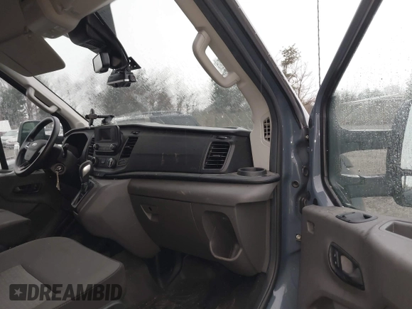 2021 Ford Transit Cargo with VIN 1FTBR3X8XMKA57960, listed as a IAAI auction lot 41842606 with 5,176 mi miles and . Bid and sale history available at DreamBid. Image 5.