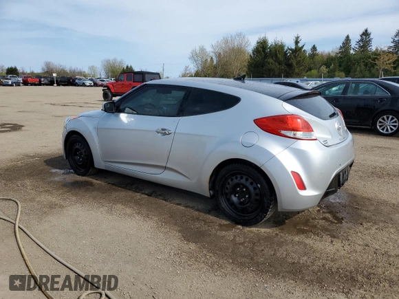 2013 Hyundai Veloster w/Black Int с VIN KMHTC6AD4DU139261, выставлен на аукционе Copart как лот 56175095 с пробегом 148 483 миль миль и Чистый • Clean title. История ставок и продаж доступна на DreamBid. Изображение 2.