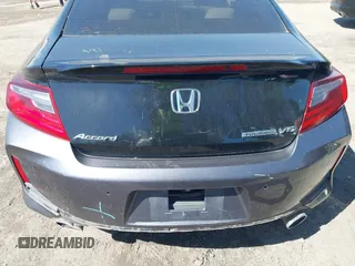 2016 Honda Accord Touring with VIN 1HGCT2B0XGA000686, listed as a IAAI auction lot 41888593 with 174,934 mi miles and . Bid and sale history available at DreamBid. Image 16.